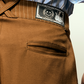 Calça Alfaiataria Cós Listrado Marrom MONOPOLY x MITTMANN